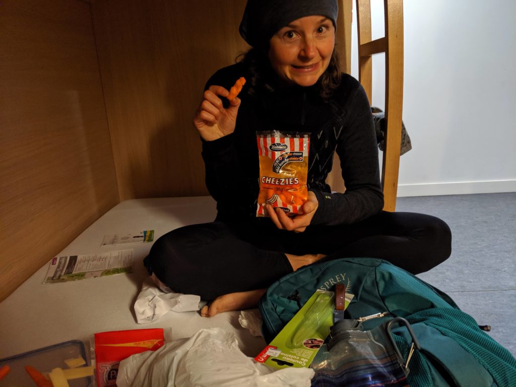 Person eating cheezies
