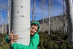 Mom hugging tree